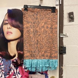 Skirt 92% polyester 8% spandex leather look print with teal fringe
